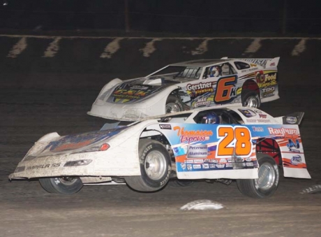 Winner Dennis Erb Jr. (28) rolls under Michael Kloos (6k). (stlracingphotos.com)