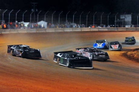 Steven Roberts (111) leds a pack through the corners. (Carolyn Johnson)