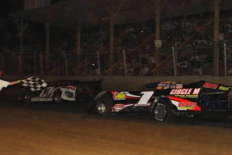 Will Vaught takes the checkered flag at Belleville. (erikgrigsbyphotos.com)