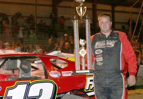 Chad Becker picks up his Jamestown hardware. (crpphotos.com)