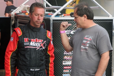 Rick Eckert (left) talks with MasterSbilt's Tader Masters. (Jason Walls)