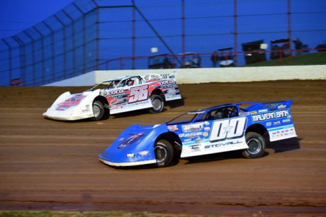 Jesse Stovall (00) and Tony Jackson Jr. (56) battle Friday. (Todd Boyd)