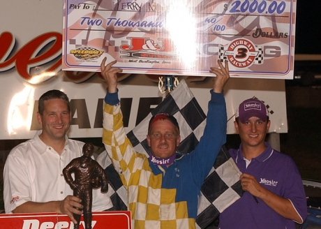 Neal celebrates in victory lane. (K.C. Rooney)