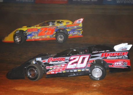 Owens (20) stalks Shane Clanton (25). (mrmracing.net)