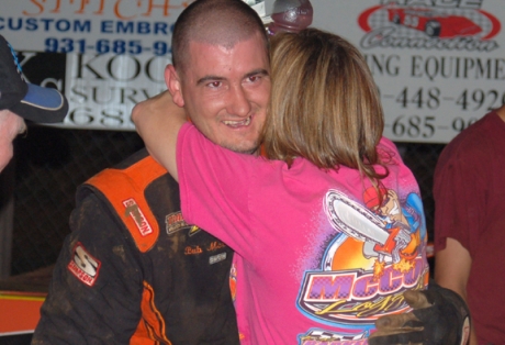 McCool gets a winning hug. (Robert Holman)