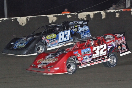 Scott James (83) races with Bobby Pierce (32) before his demise. (Jim DenHamer)