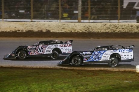 Chris Madden (0M) leads teammate Scott Bloomquist (0). (Brent Smith)