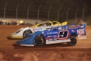 Nick Hoffman (inside) battles Tim McCreadie en route to a World of Outlaws Real American Beer Late Model Series victory Sept. 12 at Needmore Speedway in Norman Park, Ga. (Chris Anderson)