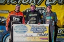 Daulton Wilson, flanked by runner-up Zack Mitchell (left) and third-finishing Nick Hoffman (right), won his first World of Outlaws Late Model Series event July 8 at Stateline Speedway in Busti, N.Y. (Emily Schwanke/woolms.com)