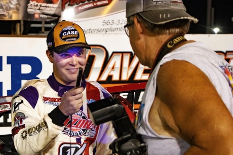 Bobby Pierce gets a victory lane cigar from Mike Ruefer. (Nate Truninger)