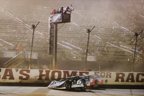 Hudson O'Neal (6) wins at the flagstand. (Zach Yost)