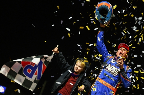 Nick Hoffman celebrates with his son at Volusia. (Josh James)