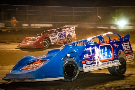 Nick Hoffman (9) battles with Bobby Pierce. (Mike Butcosk)