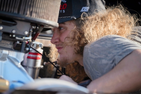 Hunter Cornell working under the hood. (Emily Schwanke/woolms.com)