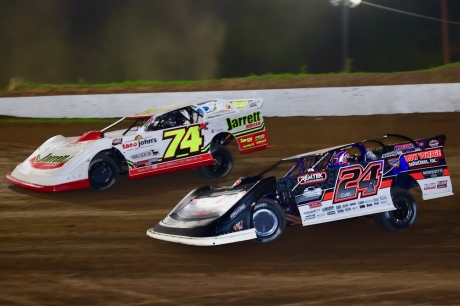 Ryan Unzicker (24) chases Ethan Dotson (74x) at Peoria. (joshjamesartwork.com)