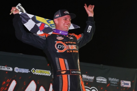 Ryan Unzicker celebrates at Fairbury. (joshjamesartwork.com)