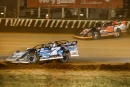 Winner Ricky Thornton Jr. (20rt) stalks Drake Troutman (7) on Nov. 7 en route to his World of Outlaws Case Late Model Series victory in Charlotte&#039;s World Finals. (Zach Yost)