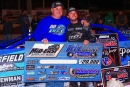 Petey Ivey (left) joins his son Trent Ivey in victory lane Nov. 17 at Cherokee Speedway in Gaffney, S.C., after his Blue-Gray 100 victory. They&#039;re the first father-son duo to win the event. (ZSK Photography)