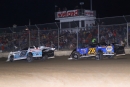 Devin Moran (99) outran Brandon Overton (76) on Feb. 4 at Ocala (Fla.) Speedway for a Wieland Winter Nationals victory on the Lucas Oil Late Model Dirt Series. (mikerueferphotos.photoreflect.com)