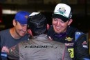 Garrett Alberson (right) is congratulated by Devin Moran after Feb. 13&#039;s World of Outlaws victory at Volusia Speedway Park in Barberville, Fla. (joshjamesartwork.com)