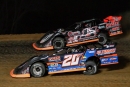 Winner Ricky Thornton Jr. (20rt) and runner-up Josh Rice (11) battle for the lead in March 21&#039;s Lucas Oil Late Model Dirt Series action at Atomic Speedway near Chillicothe, Ohio. (heathlawsonphotos.com)
