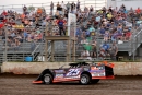 Chad Simpson takes the checkers June 15 at Mason City (Iowa) Motor Speedway for his $3,000 Malvern Bank East Series victory. (mikerueferphotos.photoreflect.com)