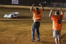 Crew members celebrate as Kyle Thomas heads for a July 3 RUSH Crate Late Model Series victory at Tyler County Speedway in Middlebourne, W.Va. (Zach Yost)
