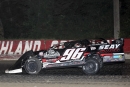 Tanner English on his way to a $12,000 victory in Aug. 13&#039;s World of Outlaws Real American Beer Late Model Series feature at Highland (Ill.) Speedway. (mikerueferphotos.photoreflect.com)