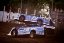 Dustin Sorensen finds himself in a precarious position during WoO heat action at River Cities Speedway in Grand Forks, N.D. (Emily Schwanke/woolms.com)