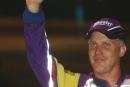 Dale McDowell waves from victory lane July 31, 2004, after his World of Outlaws Late Model Series victory at Tri-State Speedway in Haubstadt, Ind. (Brian McLeod)