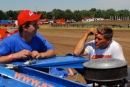 Darren Miller (left) and Steve Kosiski visit in the Boone County Speedway pits in Albion, Neb., before WDRL competition on July 23, 2006. (Jerry Jacobs)