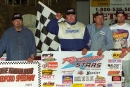 Jackie Boggs and his team celebrate his April 27, 2001, Renegade STARS Series victory at Bedford (Pa.) Speedway. (rickschwalliephotos.com)