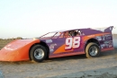 Bob Jeffery tunes up in a new Rayburn Race Car on July 10, 2004, before his Pacific Coast Xtreme DirtCar Series victory at Madras (Ore.) Speedway. (Steve Reeck)