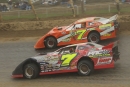 Matt Miller (7) goes under Ben Adkins (B7) en route to his Oct. 9, 2005, UMP Fall Nationals victory at Ohio's Eldora Speedway. (DirtonDirt.com)