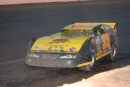 Al Purkey works around the bottom groove at Central Arizona Raceway in Casa Grande, Ariz., during the Early Thaw on Jan. 17, 2004. (Brian McLeod)