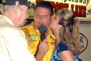 Scott Autry gets a victory lane kiss after winning the 2003 Carolina Clash Super Late Model Series stop at 311 Speedway in Madison, N.C. (DirtonDirt.com)