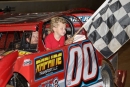 Tyler Bare picked up a hitchhiker for victory laps at Winchester (Va.) Speedway on July 19 in winning the Junior Boone Memorial for Super Late Models. (Clifford Dove)