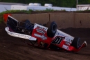 Daryn Klein ended up on his led after retaliation from Bob Gardner during a MARS heat race caution July 18 at Farmer City (Ill.) Raceway. (joshjamesartwork.com)