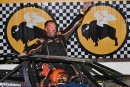 Chad Becker emerges July 25 after winning the Repairable Vehicles.com Tri-State Series feature at Brown County Speedway in Aberdeen, S.D. (Jamie Laine)
