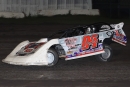 Tad Pospisil heads for a $5,000 victory Oct. 4 at Adams County Speedway in Corning, Iowa, on the Malvern Bank East and West circuits. (mikerueferphotos.photoreflect.com)