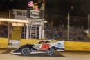 Cory Hedgecock takes the checkers Oct. 4 for a Southern Thunder Super Dirt Series victory at Senoia (Ga.) Raceway. (praterphoto.com)